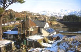 Spot the solar thermal and solar electric arrays. turf roofed lined with sheeps wool and cosy.